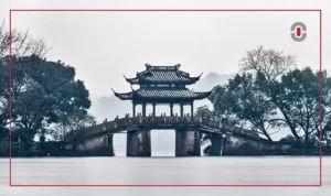 A traditional Chinese pavilion on a stone bridge, symbolizing the delicate bridge between cultures—highlighting how AI supports brands in preserving emotional and cultural nuance beyond translation.