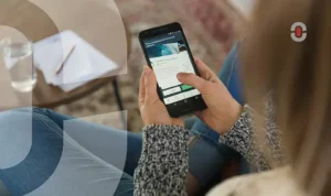 Close-up of a person using a mobile translation or content app on a smartphone, emphasizing real-time AI-assisted communication and accessibility.