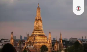 View of Wat Arun temple at sunset in Bangkok, symbolizing the cultural and religious depth essential to accurate Thai translation.